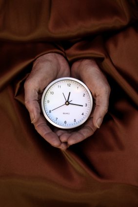 Monk with clock